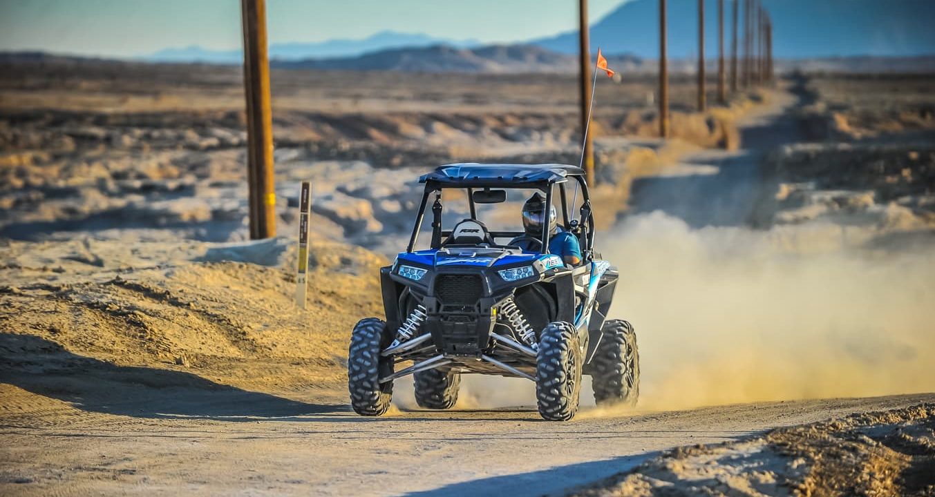 Riding an RTV though sandy terrain