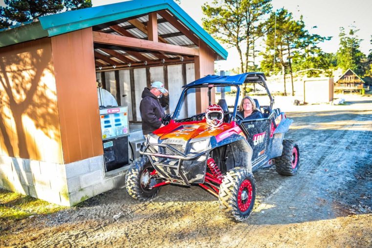 Fueling up a rental at Oregon Dunes Motorsports Service & Parts shop