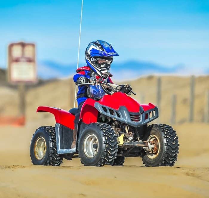 Child riding in Palm Springs on a kid-friendly ATV