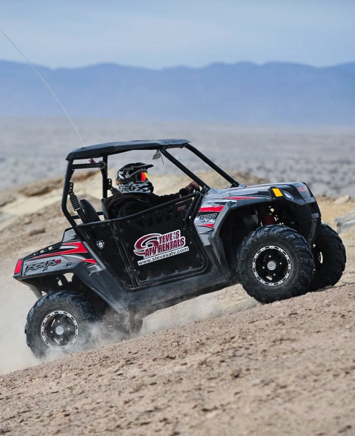 Guest riding uphill on a Polaris RZR 800-2 at Palm Springs