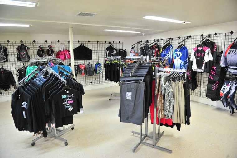 Clothing racks at the Salton City Offroad service and parts center